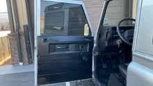 Load image into Gallery viewer, SOLD! 1984 &quot;The Silversmith&quot; Defender 90 Left Hand Drive
