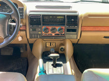 Load image into Gallery viewer, SOLD! 1999 &quot;The Green New Deal&quot; Land Rover Discovery
